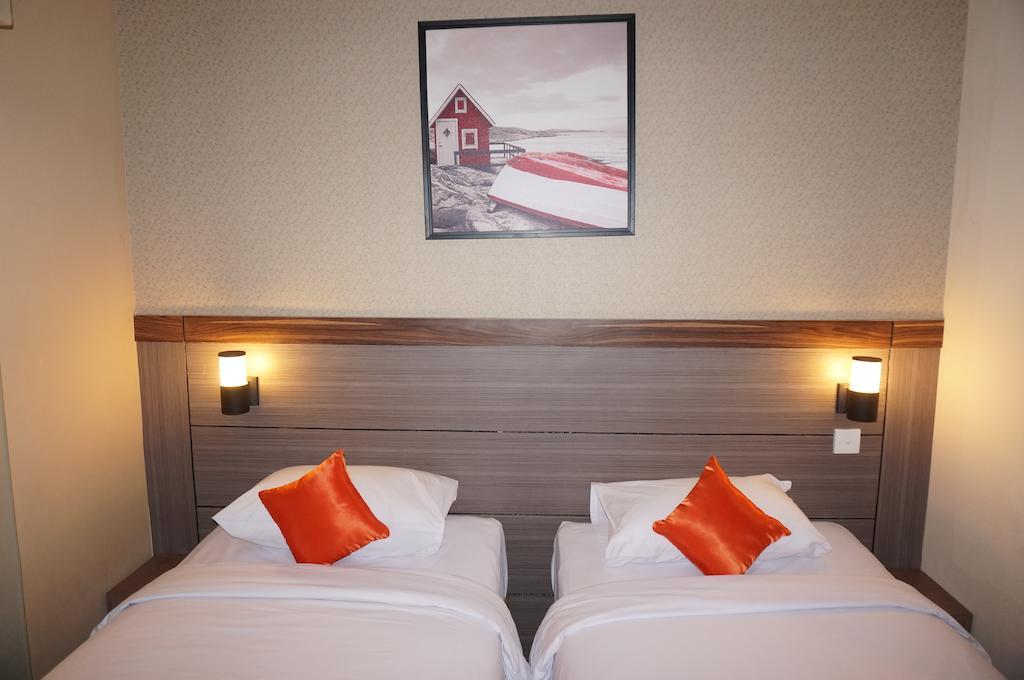 Ekon Hotel Yogyakarta Oda fotoğraf